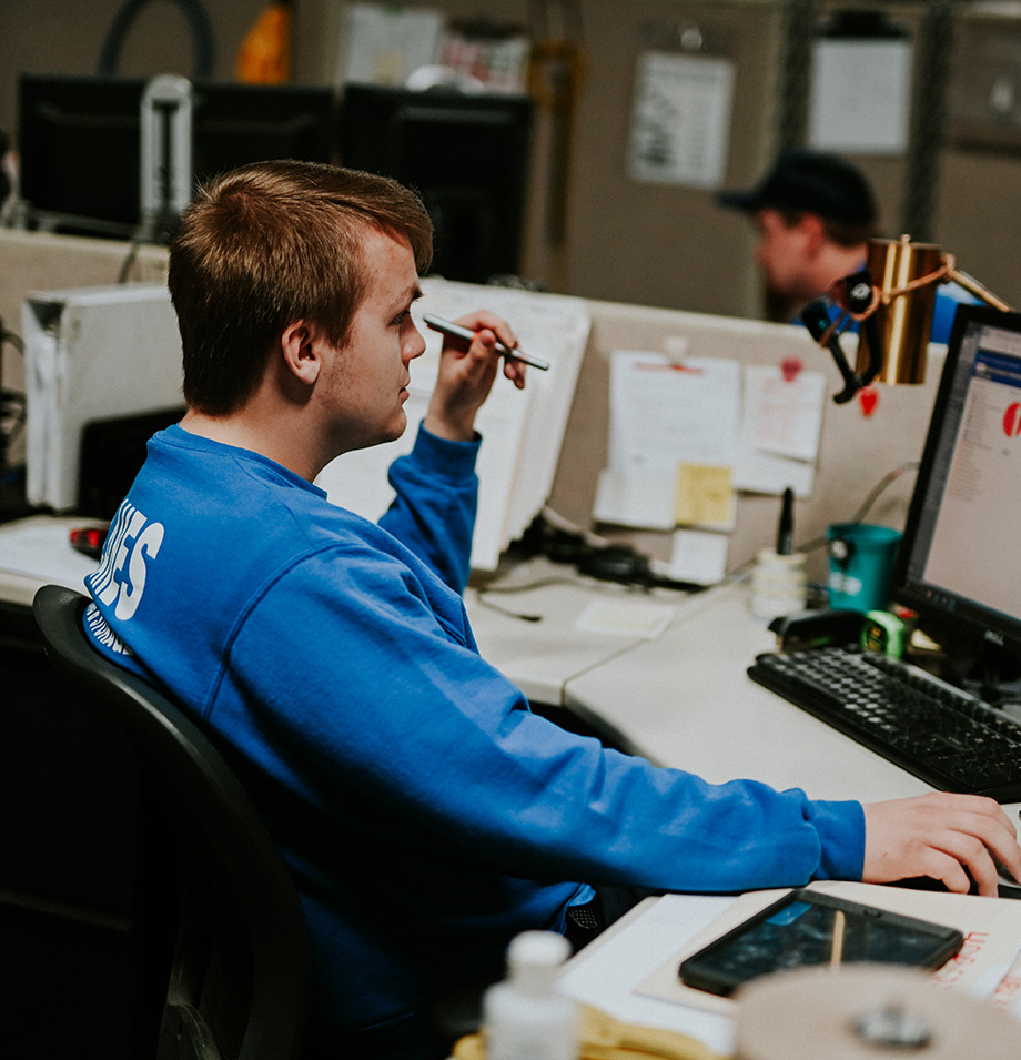 Planes employee doing computer work