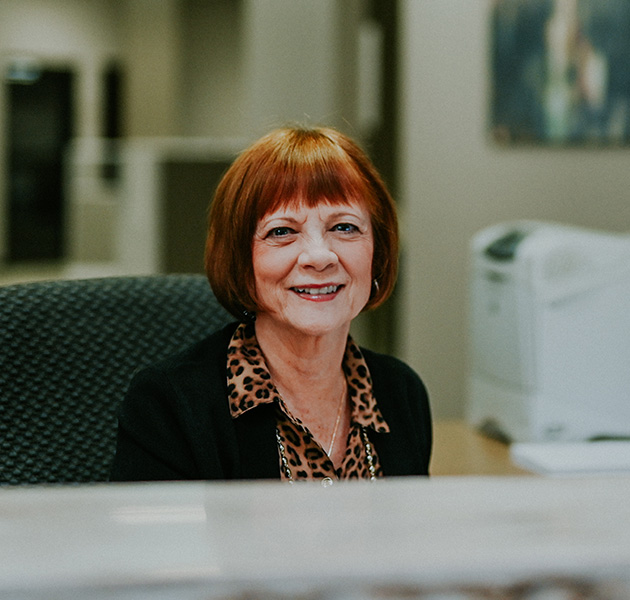 Woman sitting at the front desk