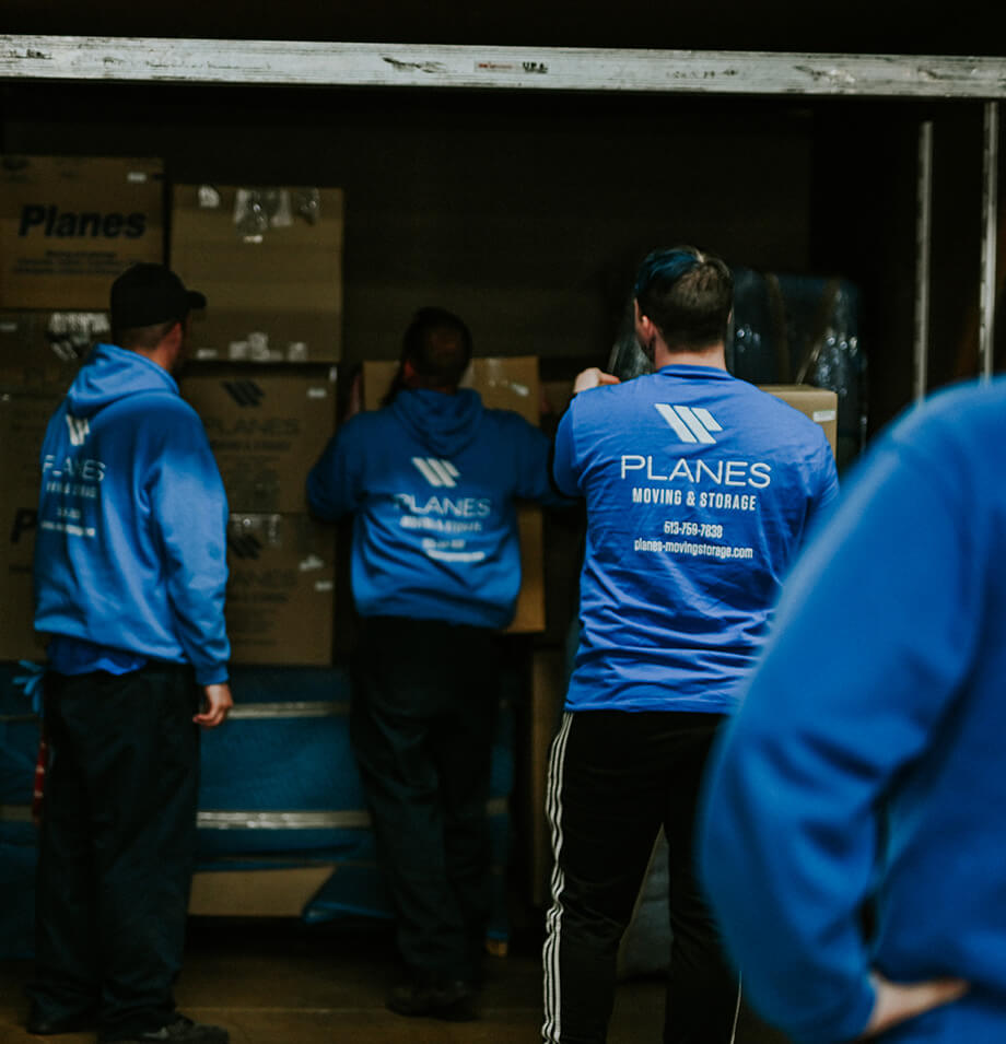 Planes movers packing a truck