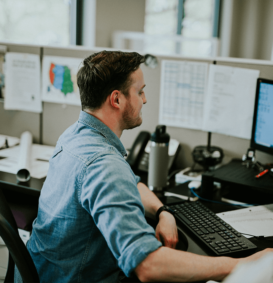 male employee at desk
